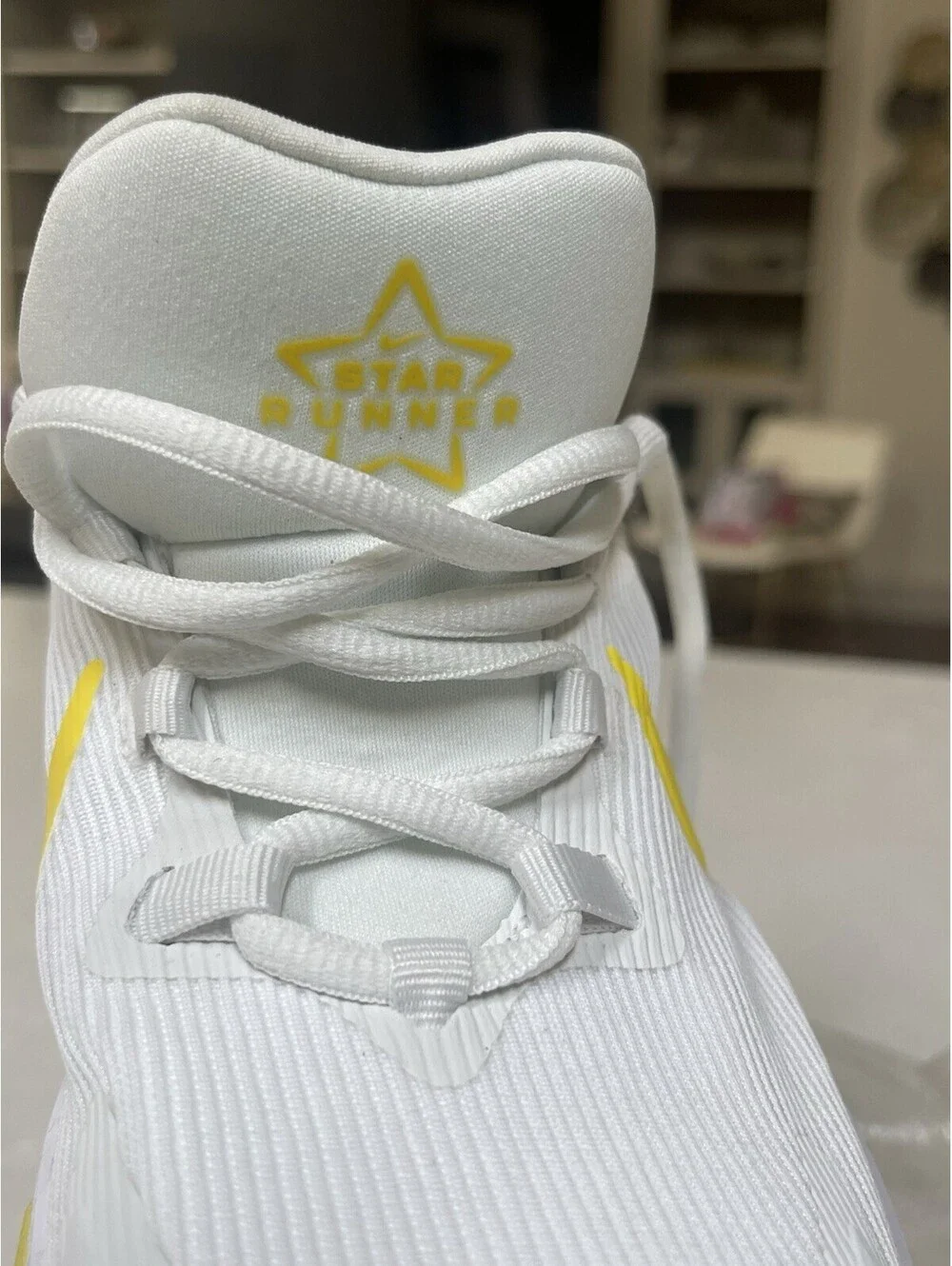 Nike Star Runner 4, Running Shoe  white with vibrant yellow Swoosh Size 5Y